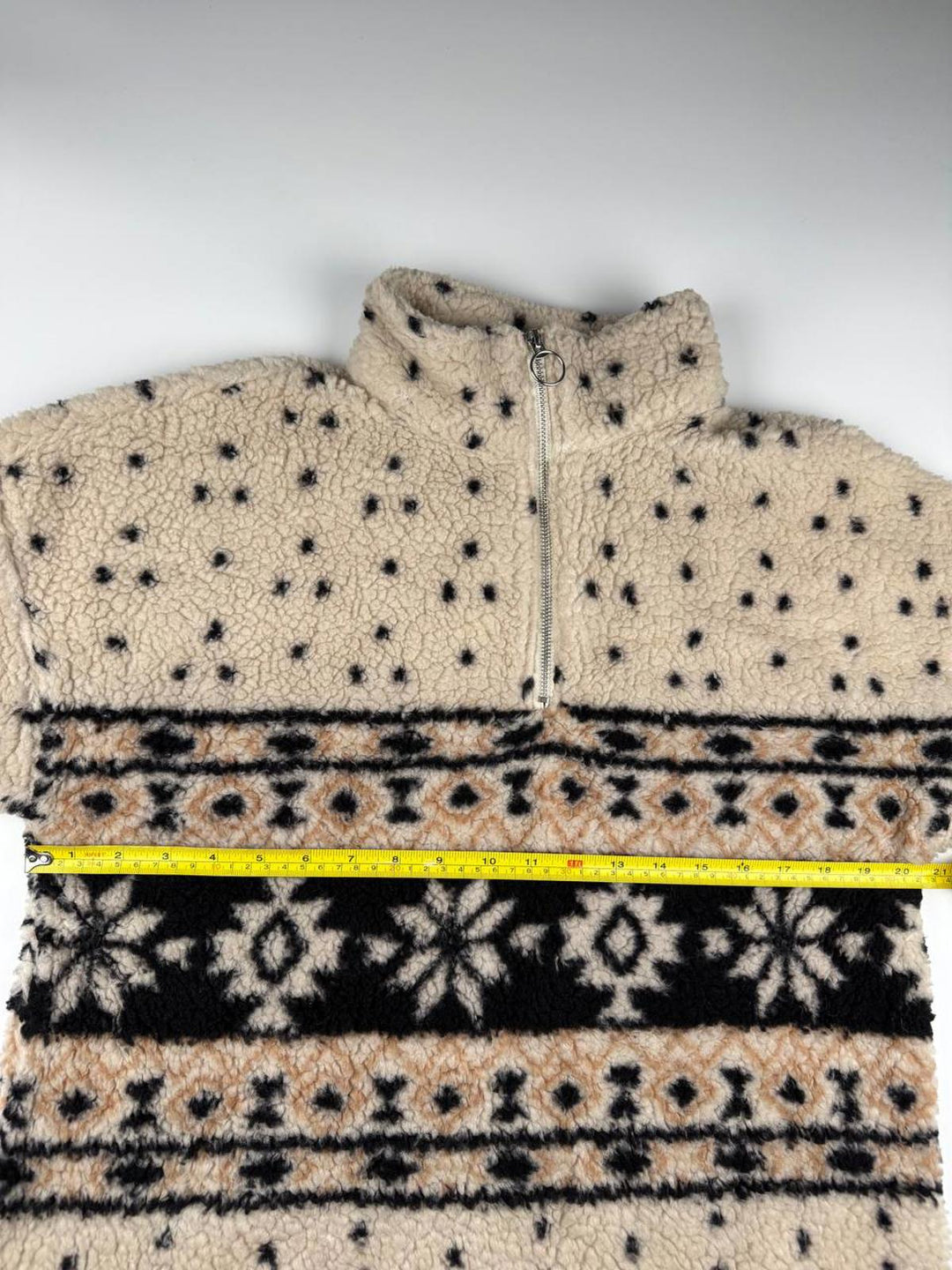 Vintage Fleece Jacket with Zip-Up Collar and Patterned Design