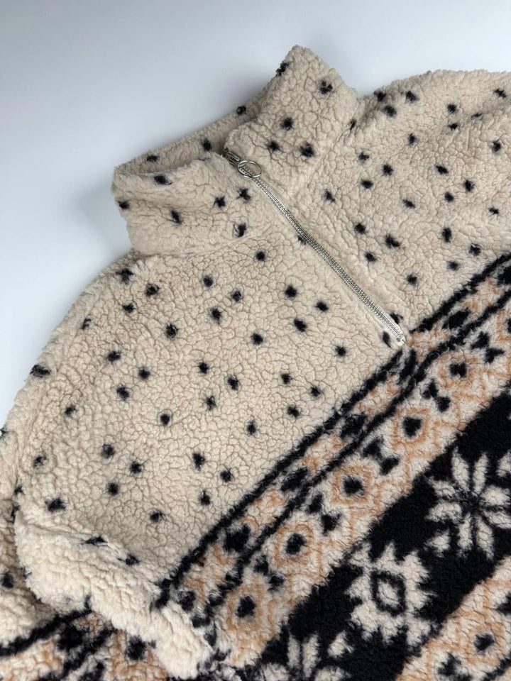 Vintage Fleece Jacket with Zip-Up Collar and Patterned Design